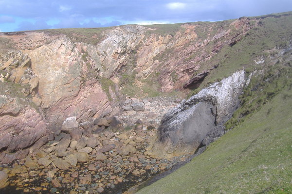 photograph of the bay beside the white arch 