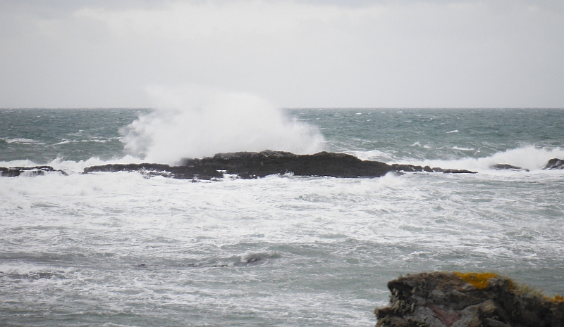  the waves crashing onto the Harry Furlough rocks 