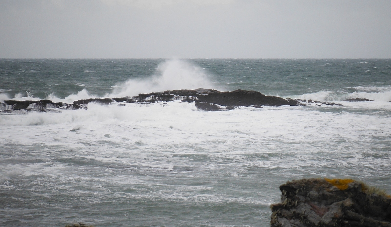  the waves crashing onto the Harry Furlough rocks 