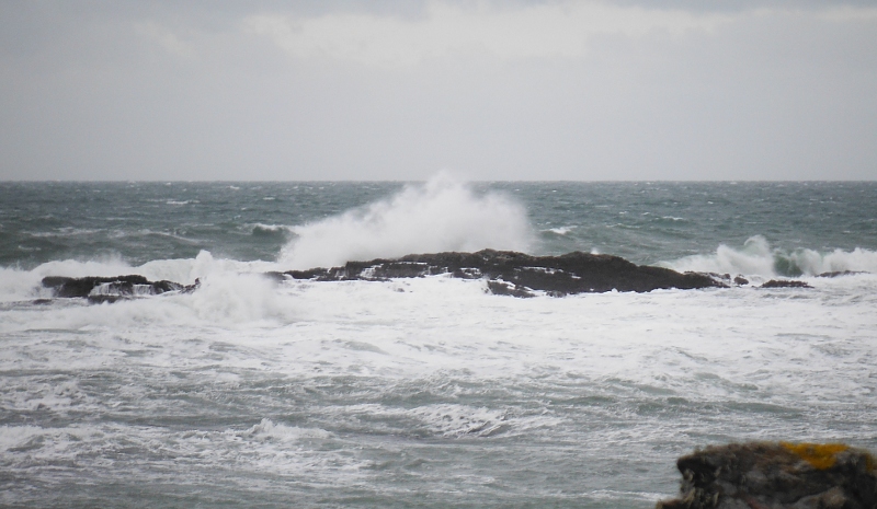  the waves crashing onto the Harry Furlough rocks 