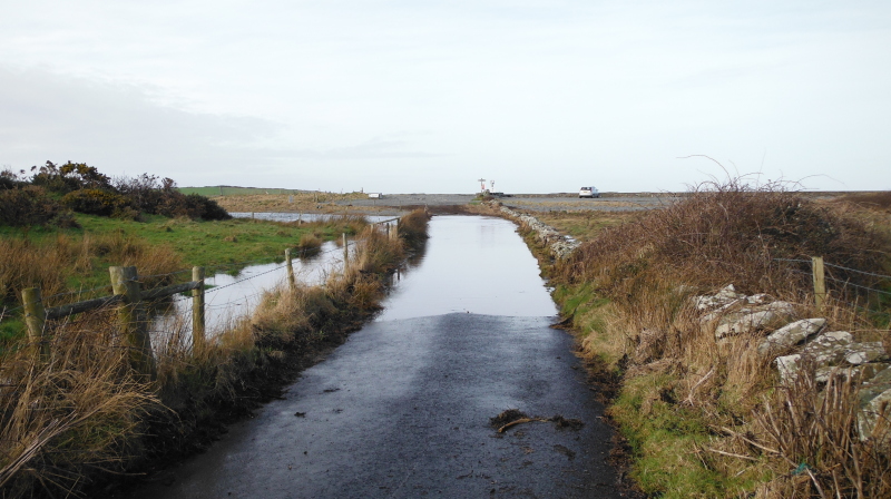 the flooded access road to the other car park 