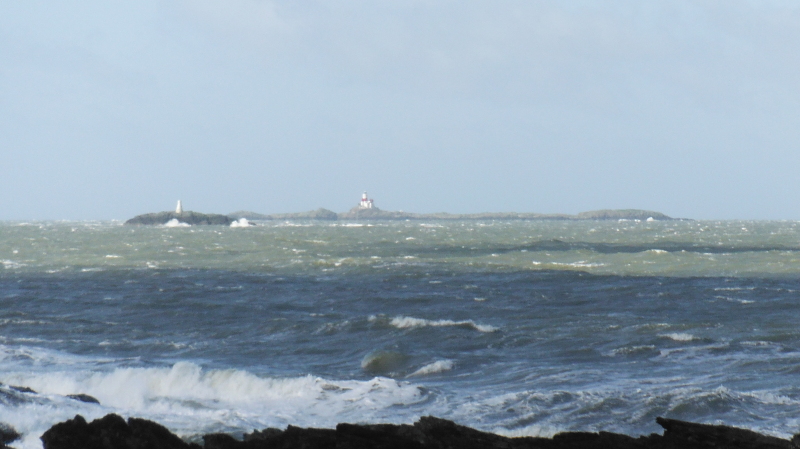 waves breaking over the Harry Furlough Rocks 