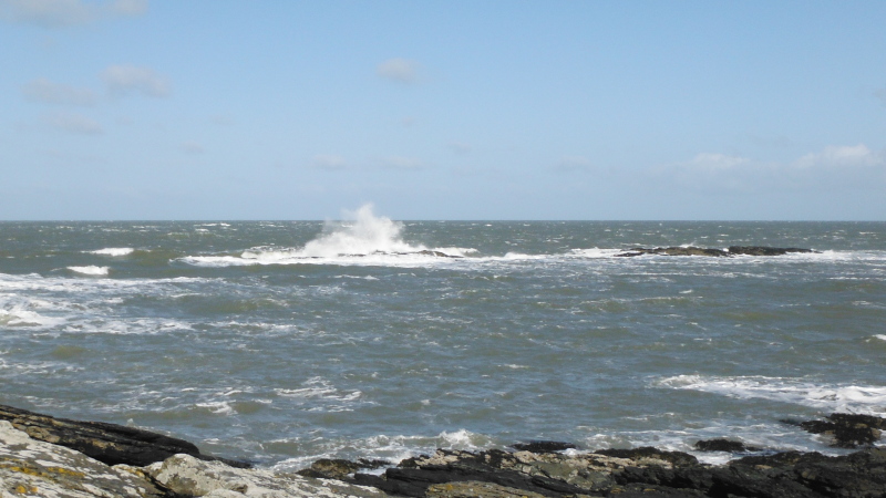 waves breaking over the Harry Furlough Rocks 