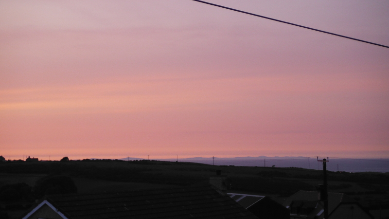 a nice sunset, with the Isle of Man in the distance 