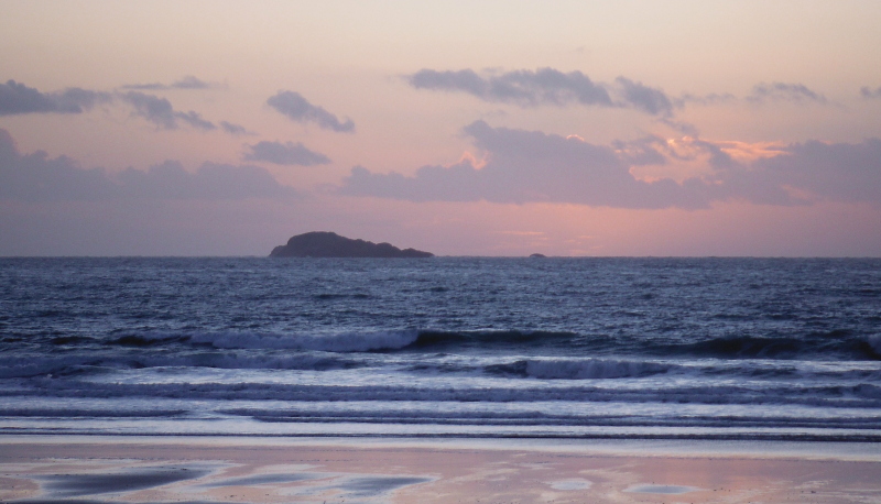  the sun setting beyond Carreg Rhoson 