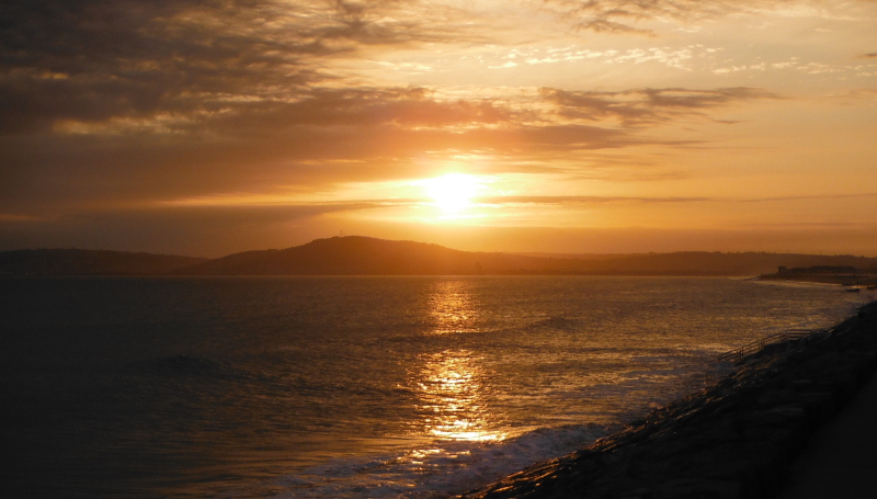  the sunset across Swansea Bay 