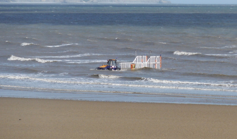  the tractor and trailer out in the waves 