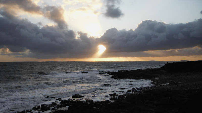  the sunset looking across Swansea Bay 