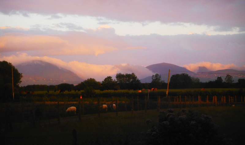  the banks of cloud lit up by the last of the sunshine 