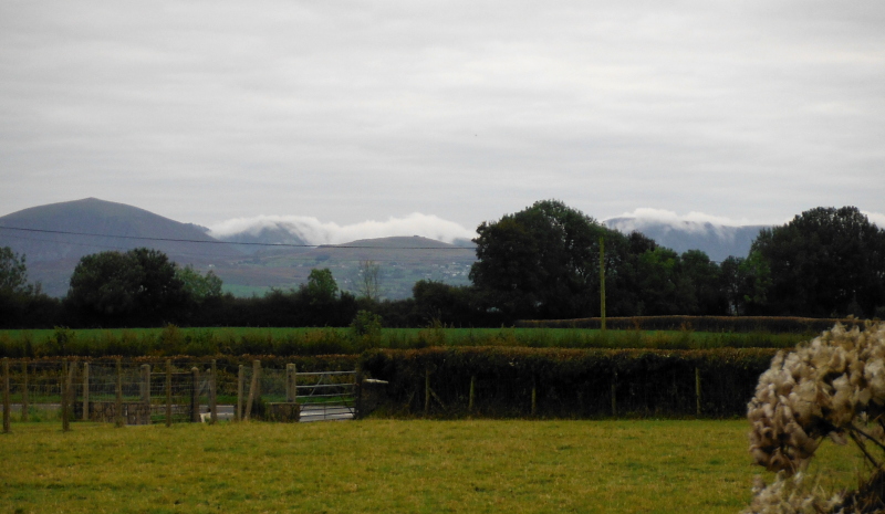  the cloud flowing over the summits of the Nantlle Ridge 