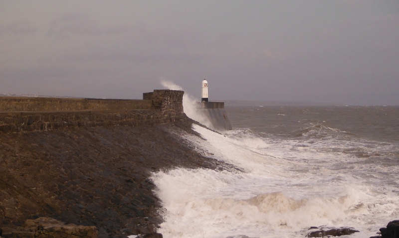  big waves crashing onto the seawall 