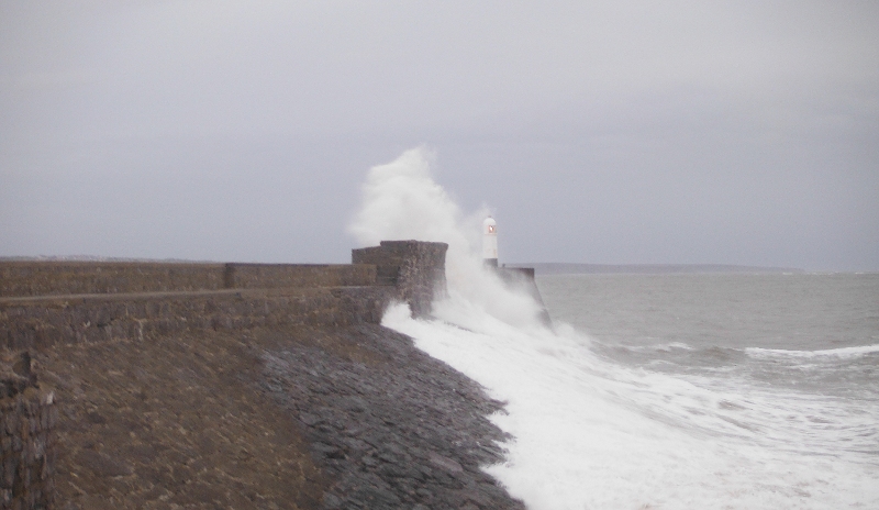  the sea crashing onto the sea wall 