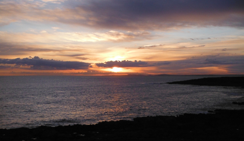  the sunset across Swansea Bay 