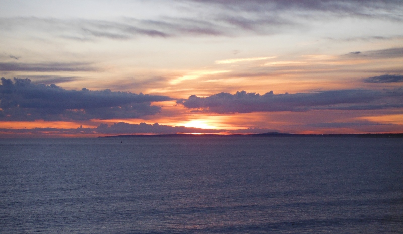  the sunset across Swansea Bay 