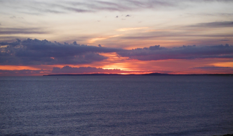  the sunset across Swansea Bay 