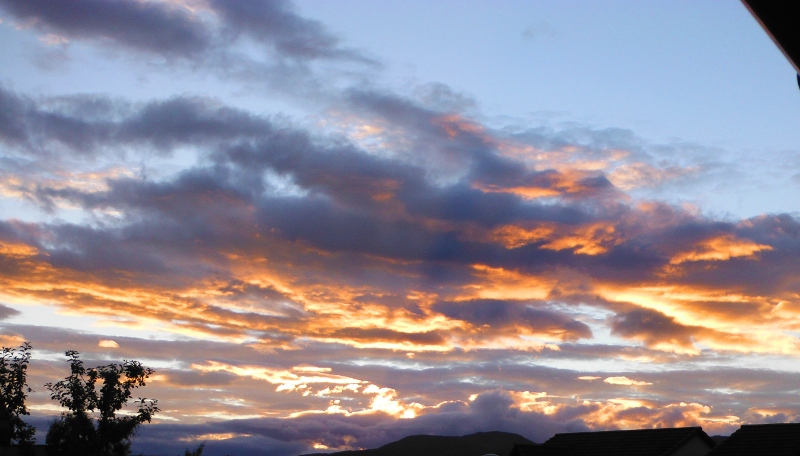  the sunset beyond the rooftops 