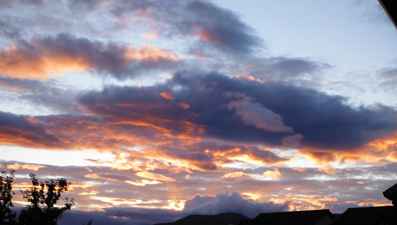  the sunset beyond the rooftops 