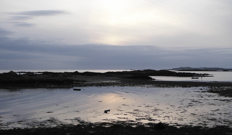  looking out over the beach and the rocks 