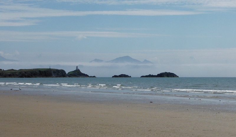  looking along the beach to Llanddwyn Island and Yr Eifl 