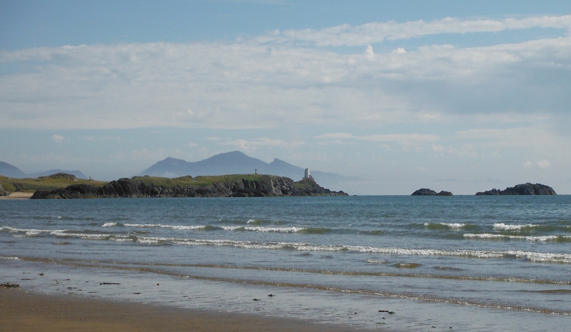  looking back along the beach to Llanddwyn Island and Yr Eifl 