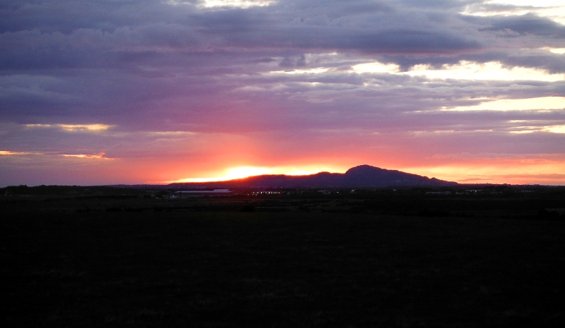  the sunset behind Holyhead Mountain 