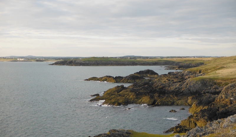  looking along the coast to Barclodiad y Gawres 