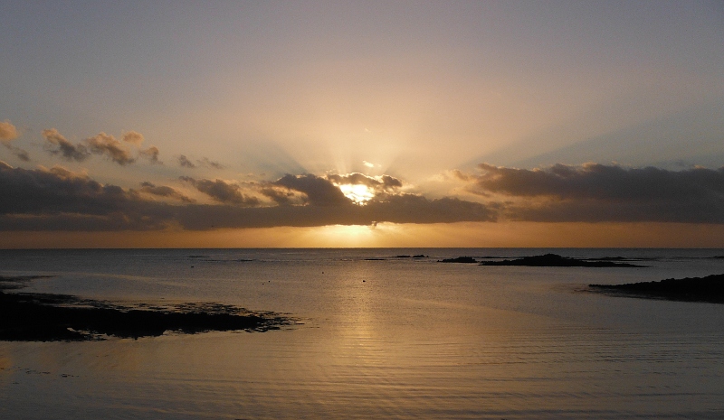  the sun behind the cloud 