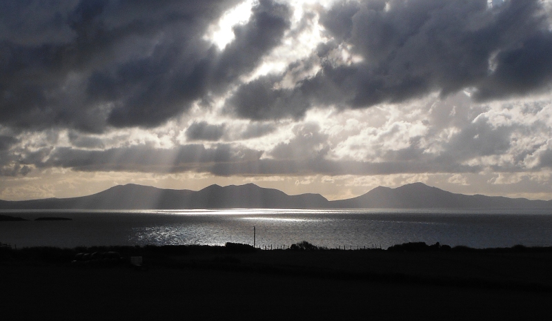  the shafts of sunlight over the mountains 