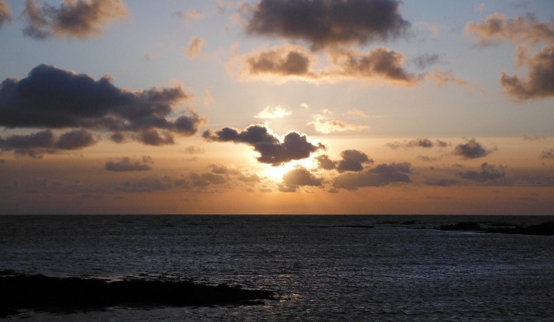  the sun shining through the clouds 