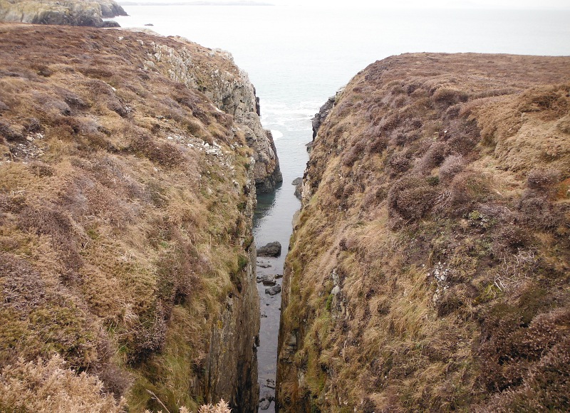  looking down into the gash in the cliffs  