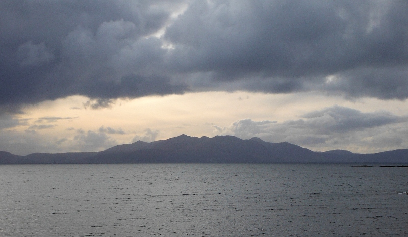  the mountains on Arran against the light patch of sky 