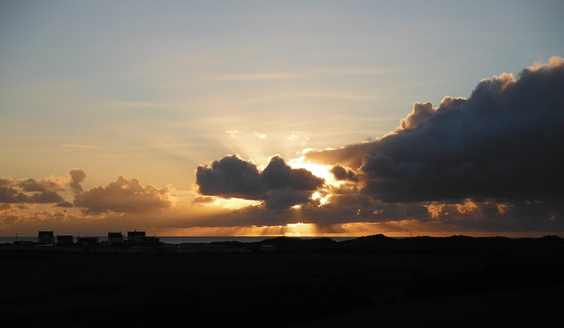  the sun behind the cloud 