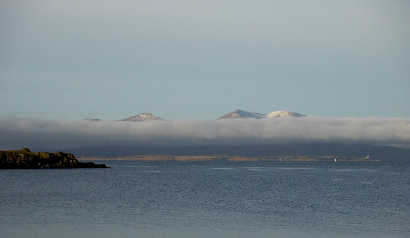  the cloud layer across the mountains 