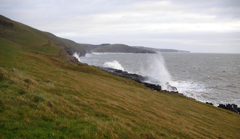  the waves crashing onto the Black Rocks 