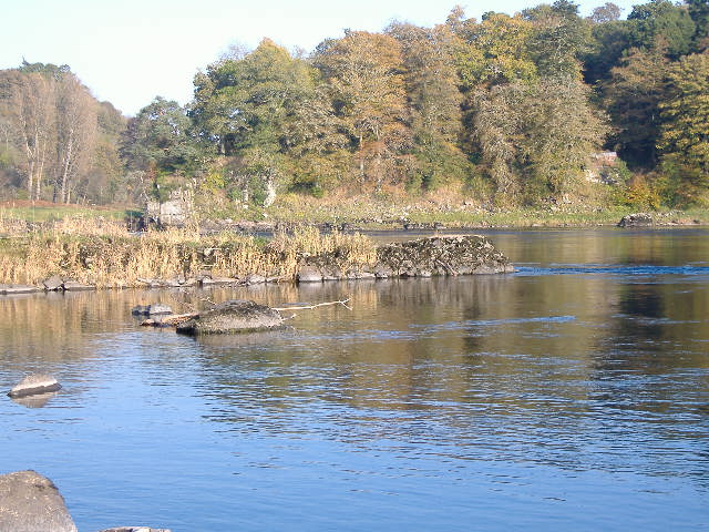 photograph taken looking up river towards the wall, when the river is at a very low level