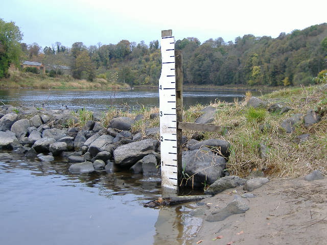 photograph of the height gauge at Burnmouth, with the river level right down at the bottom of the gauge